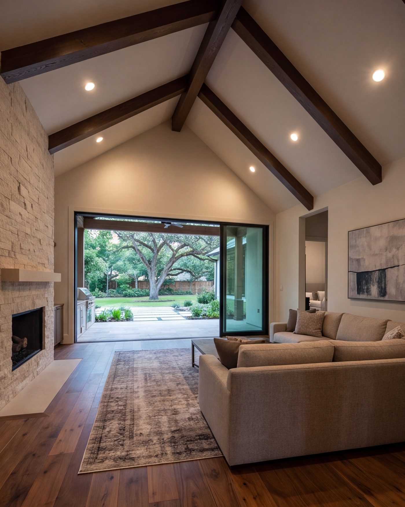 New family room addition with a vaulted ceiling and glass doors to the yard
